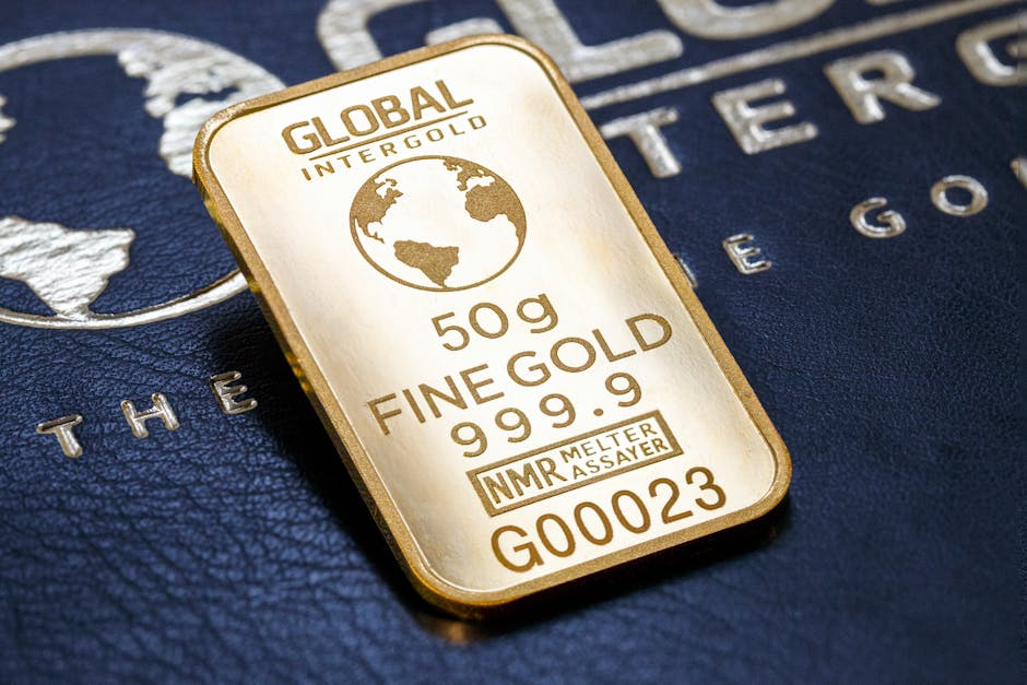 Detailed image of gold bar labeled Global Intergold on textured surface.